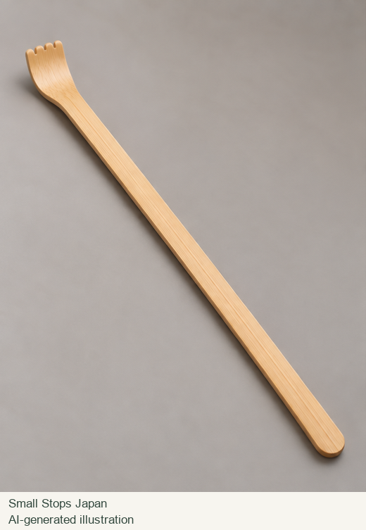 AI-generated illustration of a whole bamboo back scratcher with a long handle and a curved, shallow-notched tip.